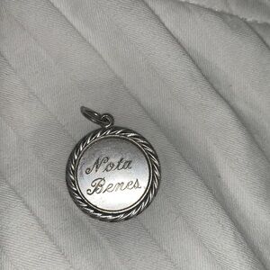 Vintage “Nota Benes” sterling silver (by Wells Sterling Co.) charm stamped